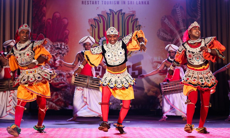 Dancers perform during a cultural dance show to promote tourism in Colombo, Sri Lanka, on March 25, 2022.Photo:Xinhua