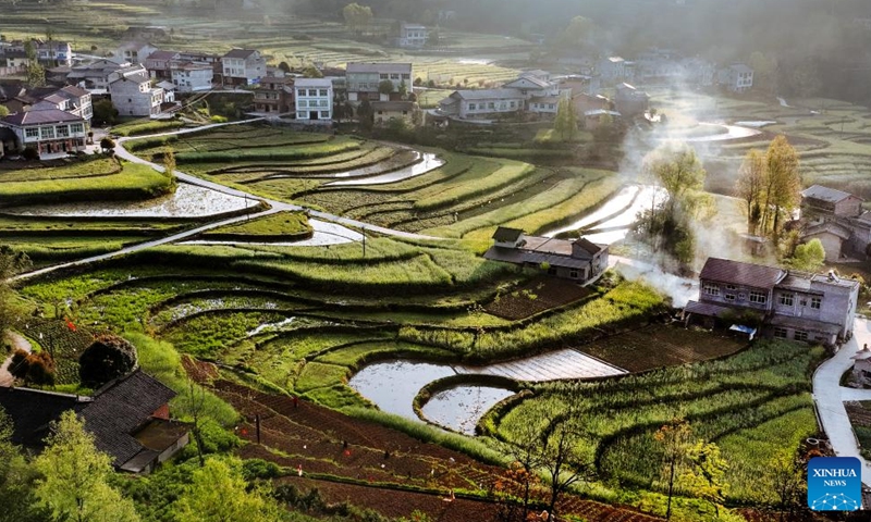 Aerial photo taken on April 3, 2022 shows the scenery of the terraced field in Ankang, northwest China's Shaanxi Province.Photo:Xinhua