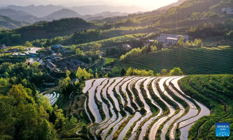 Aerial photo taken on April 3, 2022 shows the scenery of the terraced field in Ankang, northwest China's Shaanxi Province.Photo:Xinhua