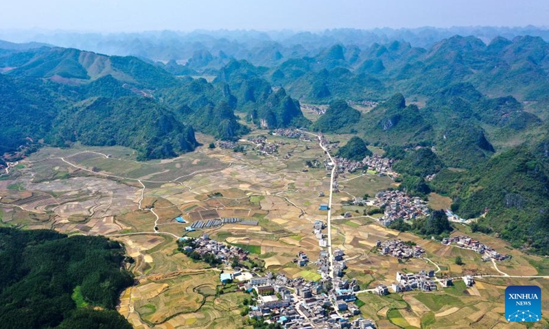 Aerial photo taken on April 8, 2022 shows the scenery of a planting base of selenium-rich rice in Longkou Village of Dahua Yao Autonomous County, south China's Guangxi Zhuang Autonomous Region.Photo:Xinhua