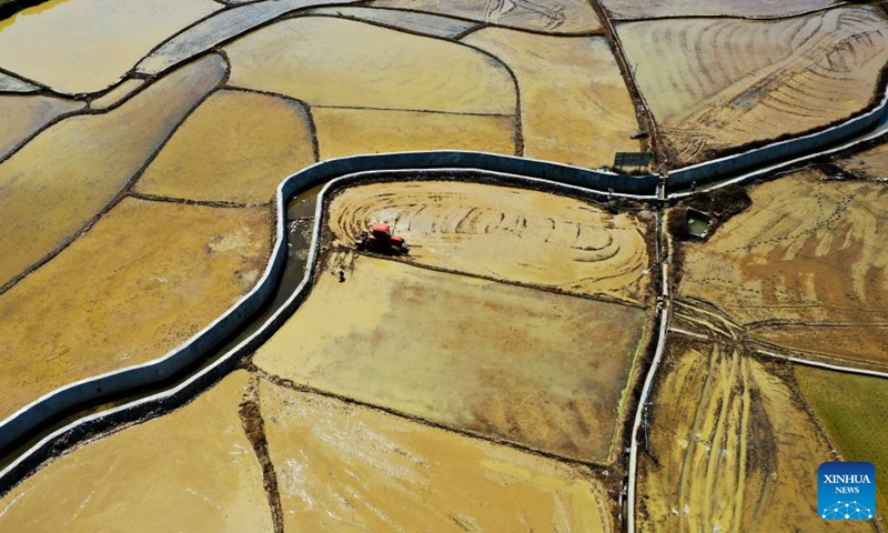 Aerial photo taken on April 8, 2022 shows the scenery of a planting base of selenium-rich rice in Longkou Village of Dahua Yao Autonomous County, south China's Guangxi Zhuang Autonomous Region.Photo:Xinhua