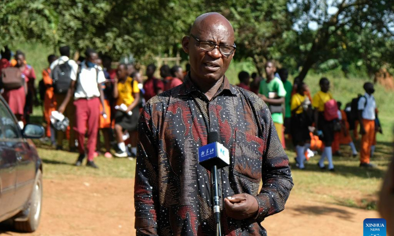 Ephraim Muwonge, deputy headmaster of Entebbe Comprehensive Secondary School, speaks in an interview with Xinhua in Wakiso, Uganda, April 5, 2022. Photo: Xinhua