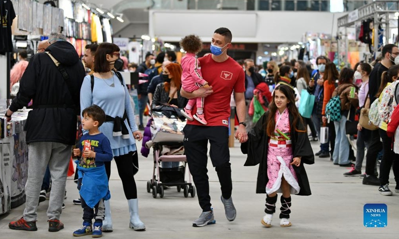 People visit Romics, a four-day international festival of comics, animation and games in Rome, Italy, on April 8, 2022.Photo:Xinhua