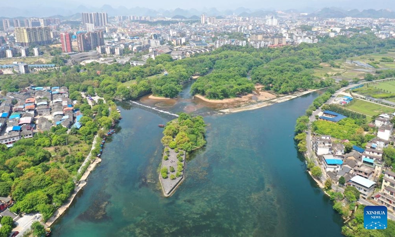 Aerial photo taken on April 9, 2022 shows Lingqu Canal in Xing'an County, south China's Guangxi Zhuang Autonomous Region. Lingqu, one of the world's oldest and most well-preserved artificial canals, was inscribed on the World Heritage Irrigation Structures in 2018.Photo:Xinhua