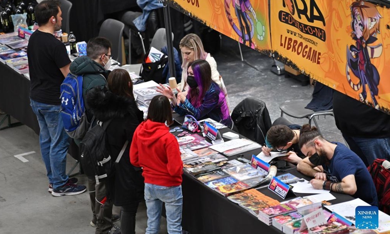 People visit Romics, a four-day international festival of comics, animation and games in Rome, Italy, on April 8, 2022.Photo:Xinhua