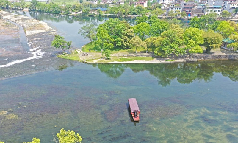 Aerial photo taken on April 9, 2022 shows Lingqu Canal in Xing'an County, south China's Guangxi Zhuang Autonomous Region. Lingqu, one of the world's oldest and most well-preserved artificial canals, was inscribed on the World Heritage Irrigation Structures in 2018.Photo:Xinhua