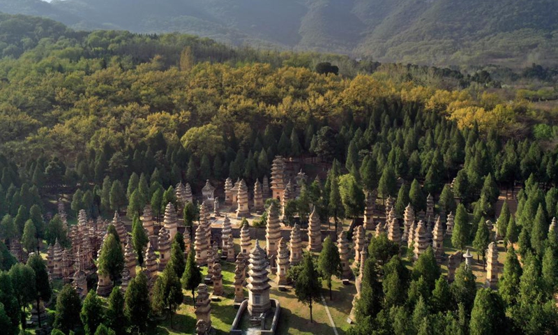 Aerial photo taken on April 7, 2022 shows the Pagoda Forest at Shaolin Temple in Dengfeng, central China's Henan Province. The historic monuments of Dengfeng in the Center of Heaven and Earth include the ancient architectural complex at Songshan Mountain in Henan, central China.(Photo: Xinhua)