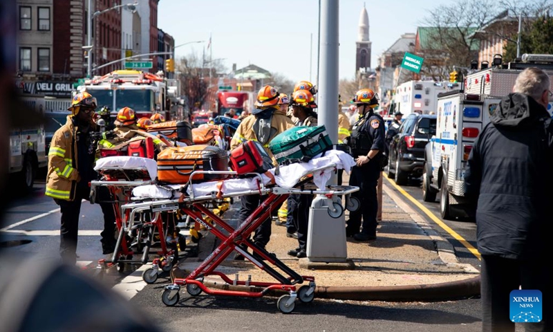 First responders work at a nearby street after a shooting took place at a subway station in Brooklyn, New York, the United States, on April 12, 2022. At least five people were shot and 13 were injured on Tuesday morning at the subway station in Brooklyn, local media reported, citing law enforcement sources.(Photo: Xinhua)