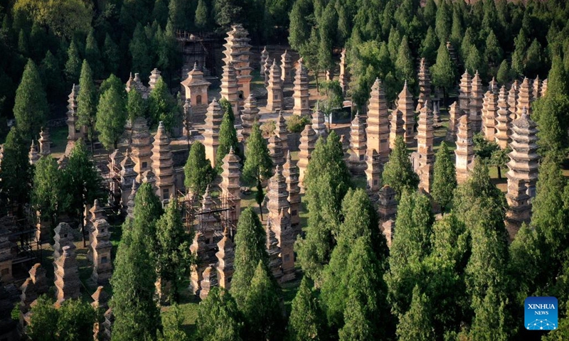 Aerial photo taken on April 7, 2022 shows the Pagoda Forest at Shaolin Temple in Dengfeng, central China's Henan Province. The historic monuments of Dengfeng in the Center of Heaven and Earth include the ancient architectural complex at Songshan Mountain in Henan, central China.(Photo: Xinhua)