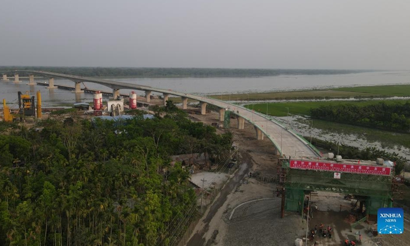 Aerial photo taken on March 23, 2022 shows the eighth Bangladesh-China Friendship Bridge under construction in Pirojpur, Bangladesh. China Railway 17th Bureau Group Co. Ltd. is constructing the bridge over Kocha River in Pirojpur district, 185 km southwest of Dhaka, under the management of China Railway Major Bridge Reconnaissance & Design Institute Co. Ltd.Photo:Xinhua