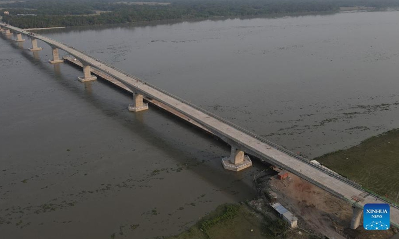 Aerial photo taken on March 23, 2022 shows the eighth Bangladesh-China Friendship Bridge under construction in Pirojpur, Bangladesh.Photo:Xinhua