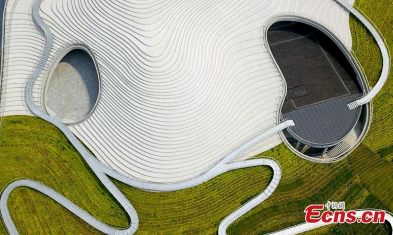 Aerial view of the eye-catching Qintai Art Museum along the Moon Lake in Wuhan, central China's Hubei Province, April 18, 2022. With a construction area of about 43,000 square meters, the museum looks like a silver terrace and will become a new landmark upon completion in Wuhan. (Photo: China News Service/Zhang Chang)