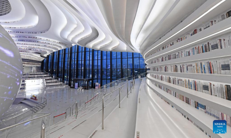 Photo taken on April 20, 2022 shows the interior view of the Tianjin Binhai Library in Tianjin, north China.

The library, a cultural landmark of Tianjin, officially opened to the public in October of 2017. Its stunning design has received a lot of attention from the public. (Xinhua/Zhao Zishuo)