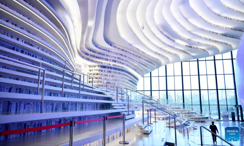 Photo taken on April 20, 2022 shows the interior view of the Tianjin Binhai Library in Tianjin, north China.

The library, a cultural landmark of Tianjin, officially opened to the public in October of 2017. Its stunning design has received a lot of attention from the public. (Xinhua/Zhao Zishuo)