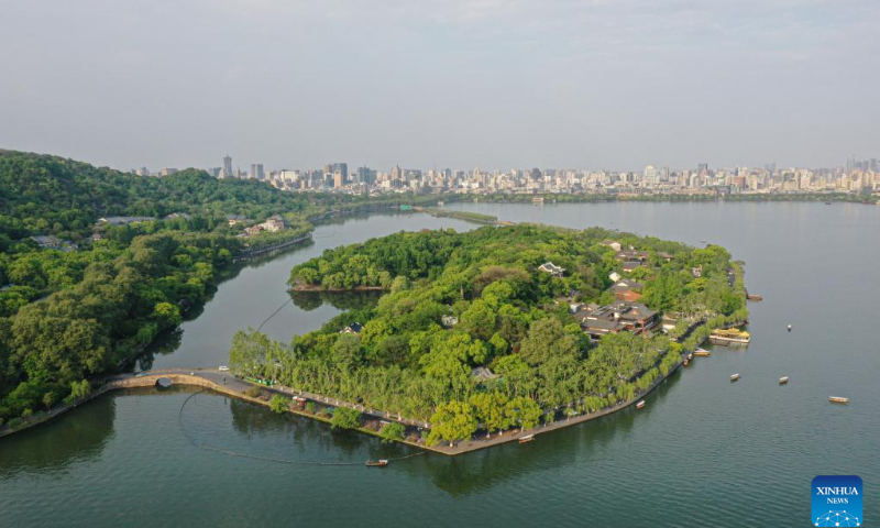 Aerial photo taken on April 12, 2022 shows a view of the West Lake scenic area in Hangzhou, east China's Zhejiang Province. West Lake is famous for its picturesque scenery as well as the historic relics. West Lake was added to the UNESCO World Heritage List in 2011. (Photo: Xinhua)