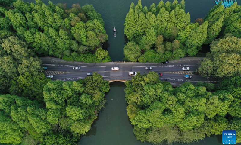 Aerial photo taken on April 12, 2022 shows a view of the West Lake scenic area in Hangzhou, east China's Zhejiang Province. West Lake is famous for its picturesque scenery as well as the historic relics. West Lake was added to the UNESCO World Heritage List in 2011. (Photo: Xinhua)