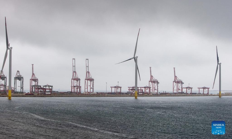 Photo taken on April 21, 2022 shows an offshore wind farm in the port of Taranto, Italy. Italy on Thursday officially inaugurated the first offshore wind power project in the country, and in the Mediterranean region. A Chinese company supplied turbines for the Beleolico project, which was connected to the grid at a ceremony in the port of Taranto in southern Italy.Photo:Xinhua