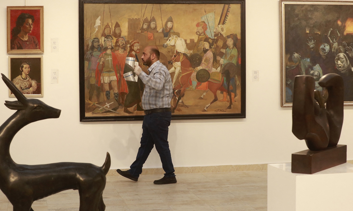 Restored artworks by renowned Iraqi artists are on display at Iraq's Ministry of Culture in Baghdad on April 6, 2022. Photo: AFP