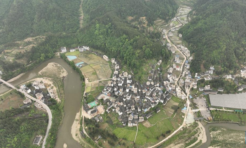 Aerial photo taken on April 26, 2022 shows the view of Yangfang Village in Taijiang County, Qiandongnan Miao and Dong Autonomous Prefecture, southwest China's Guizhou Province. Taijiang County has stepped up efforts on the provision of high-quality rice seedlings for farmers to ensure sound spring plowing activities.(Photo: Xinhua)