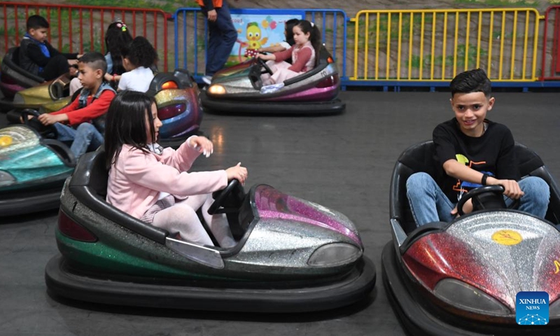 Children spend time at an amusement park during Eid al-Fitr holiday in Tunis, Tunisia, on May 2, 2022.Photo:Xinhua