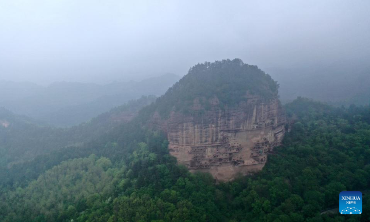 Aerial photo taken on April 29, 2022 shows a view of the Maiji Mountain Grottoes in Tianshui, northwest China's Gansu Province. The Maiji Mountain Grottoes is one of the four most famous grottoes in China. Photo:Xinhua