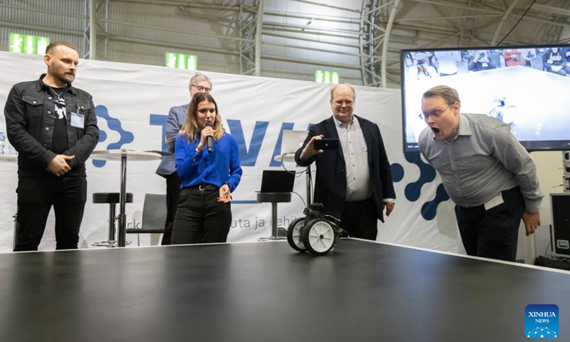 Contestants present a robot that can recognize human facial expressions during a competition for university students at Technology Fair 2022 in Helsinki, Finland on May 4, 2022Photo:Xinhua