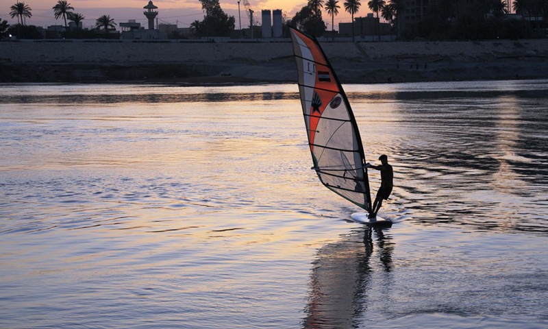 A member of the Iraqi national windsurfing team train in the Tigris River in Baghdad, Iraq, on May 08, 2022.(Photo: Xinhua)