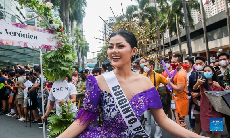 A contestant for the Binibining Pilipinas (Miss Philippines) 2022 participates in the Flores de Mayo (Flowers of May) procession in Quezon City, the Philippines, May 14, 2022. A total of 40 contestants will vie for the Binibining Pilipinas 2022 beauty pageant this year.Photo:Xinhua