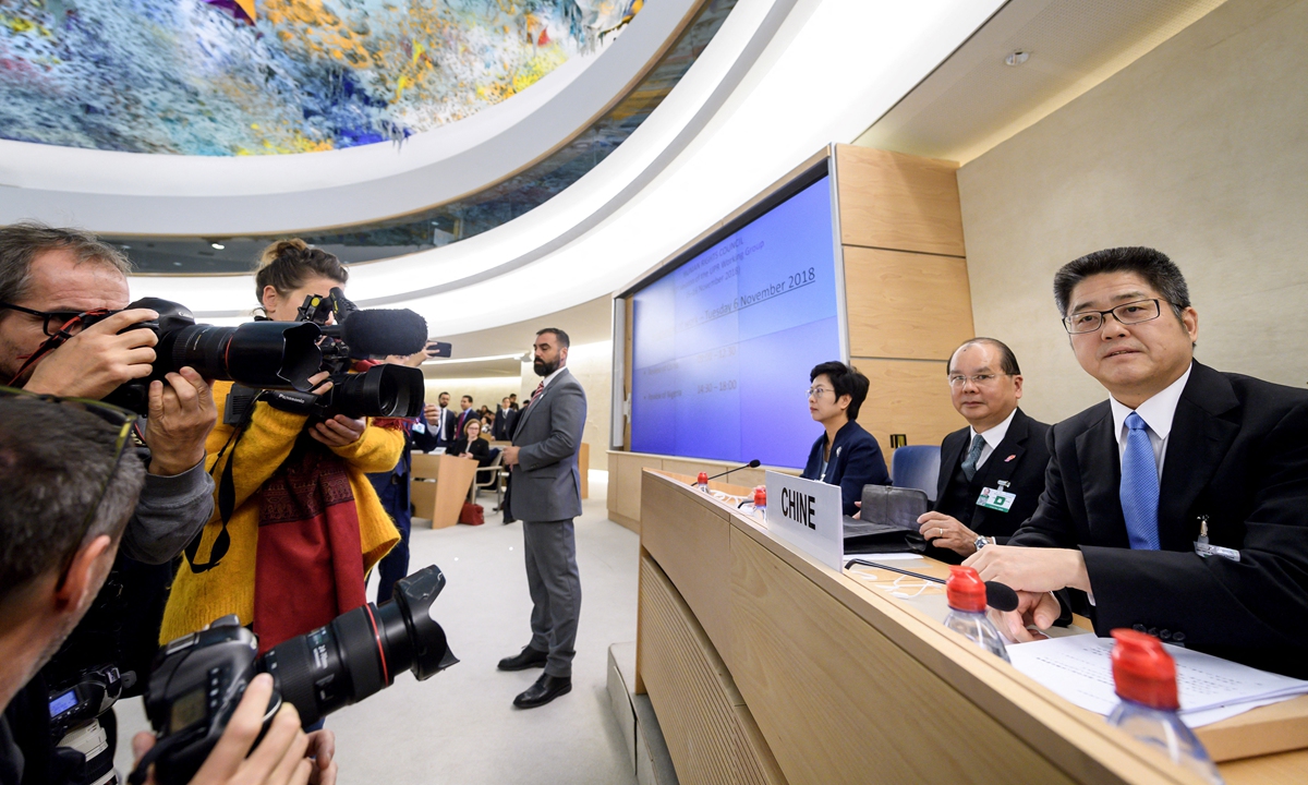 Chinese Vice Minister of Foreign Affairs Le Yucheng (right) arrives at the United Nations Human Rights Council prior to the start of the Universal Periodic Review of China on November 6, 2018 in Geneva. Photo: AFP