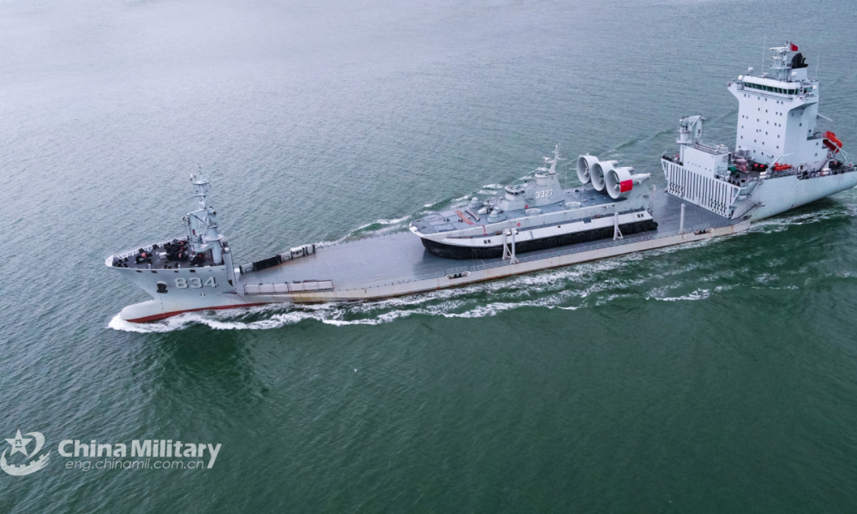 The minesweeper Suizhou (Hull 834) attached to a landing ship group with the navy under the PLA Southern Theater Command transports an air-cushioned landing craft (LCAC) to a specific location during the maritime transportation training on May 14, 2022. Photo: China Military