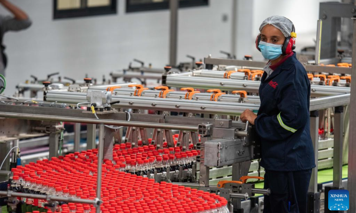 Employees work inside the Coca-Cola bottling plant in Sebeta town of Oromia regional state, Ethiopia, on May 31, 2022. The Coca-Cola Beverages Africa (CCBA) on Tuesday inaugurated its new 100 million US dollars Coca-Cola bottling plant in Ethiopia. Photo:Xinhua