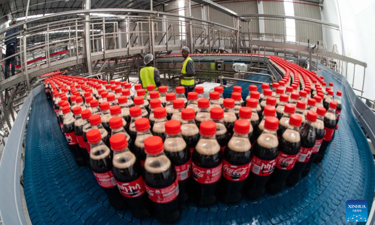 Employees work inside the Coca-Cola bottling plant in Sebeta town of Oromia regional state, Ethiopia, on May 31, 2022. The Coca-Cola Beverages Africa (CCBA) on Tuesday inaugurated its new 100 million US dollars Coca-Cola bottling plant in Ethiopia. Photo:Xinhua