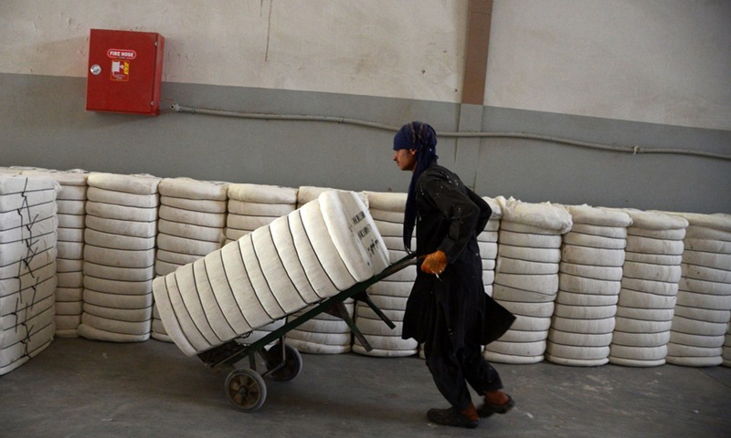 A man works at a cotton processing plant in Kandahar province, Afghanistan, May 28, 2022.Photo:Xinhua