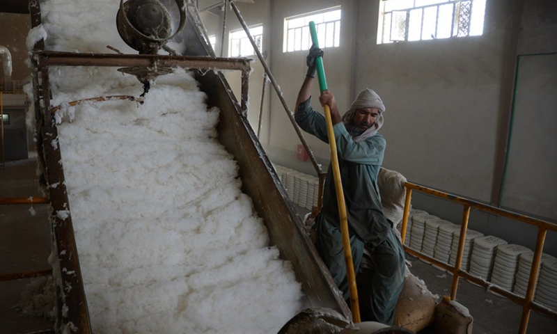 A man works at a cotton processing plant in Kandahar province, Afghanistan, May 28, 2022.Photo:Xinhua