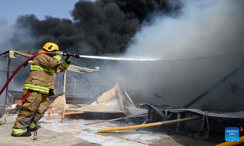 Fire erupts at tent market in Capital Governorate, Kuwait - Global Times