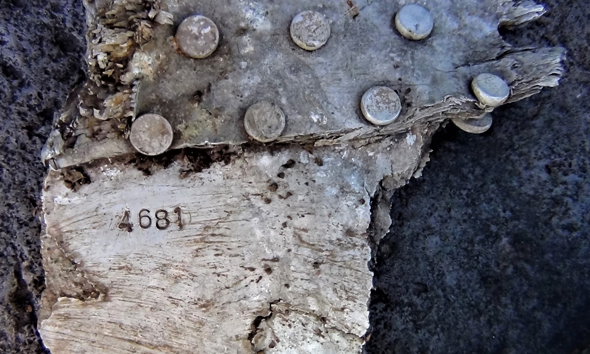 Pieces are found by US expeditor Clayton Kuhles during his mission to search the crash site of CNAC #60, a plane crached inside Southwest China's Yunann Province in 1942 during 'Flying Tigers' mission in World War II. Photo: Courtesy of MIA Recoveries, Inc.