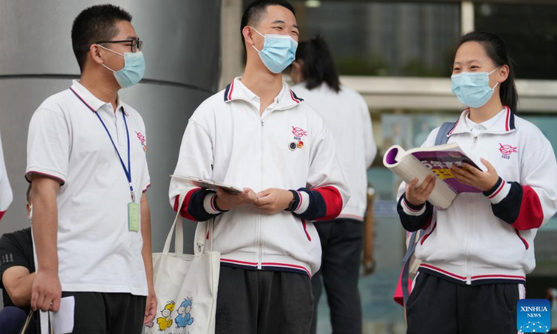 Examinees wait at an exam site in Beijing, capital of China, June 7, 2022. China's national college entrance exam, also known as gaokao, started Tuesday this year. Photo: Xinhua