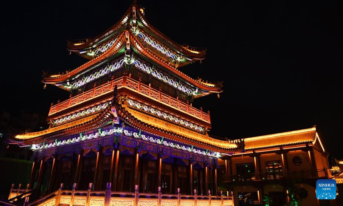 Photo taken on June 9, 2022 shows the night view of Tianshui ancient town in Tianshui City, northwest China's Gansu Province. The ancient town, a block with historical buildings in Tianshui, has been renovated and received tourists for nearly one year. The restoration is in a bid to preserve history and the city's cultural heritage. Photo:Xinhua