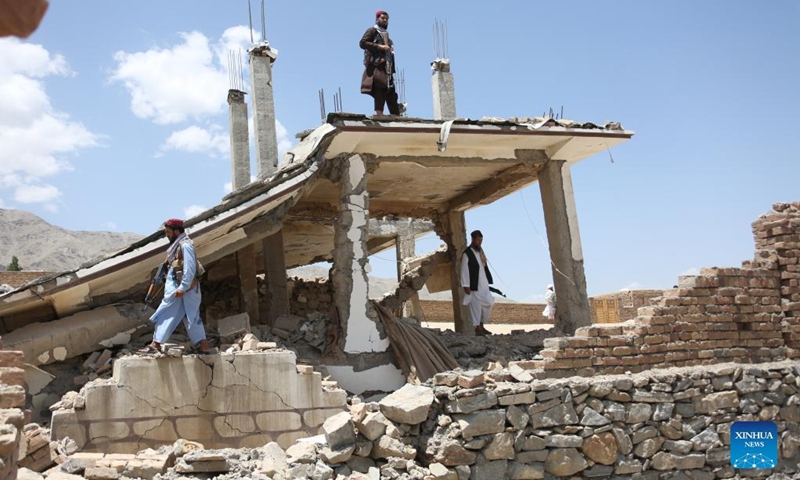 Afghan security force members stand guard at a destroyed weapon cache of the Islamic State (IS) in Parwan province, Afghanistan, June 8, 2022. Security forces have found and destroyed a weapon cache of the Islamic State (IS) in Afghanistan's eastern Parwan province, provincial police spokesman Mohammad Kamran Habibi said on Tuesday.(Photo: Xinhua)