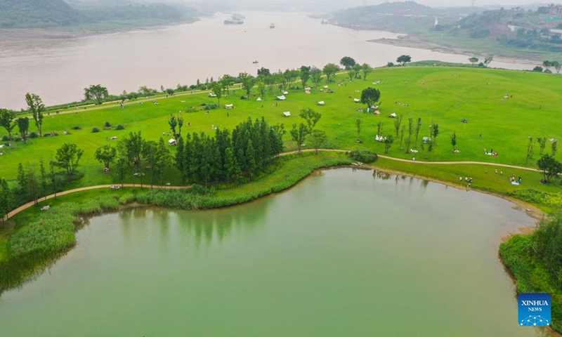 Aerial photo taken on June 5, 2022 shows a view of Guangyang Isle in southwest China's Chongqing. Guangyang Isle, the largest island on the upper Yangtze River, is rich in natural resources. In recent years, a series of measures have been taken to restore the island's ecological environment, attracting tourists to its colorful fields. (Photo: Xinhua)