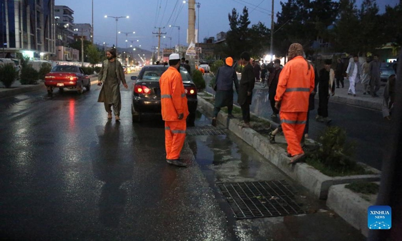 Sanitation workers clean the site of a bicycle bomb explosion in Kabul, Afghanistan, June 6, 2022. Several people were wounded following a bicycle bomb explosion in the central part of Kabul, the capital of Afghanistan on Monday, the capital police confirmed.(Photo: Xinhua)