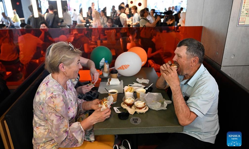 People dine at the newly opened fast food restaurant in a former McDonald's outlet in central Moscow, Russia, on June 12, 2022.Photo:Xinhua