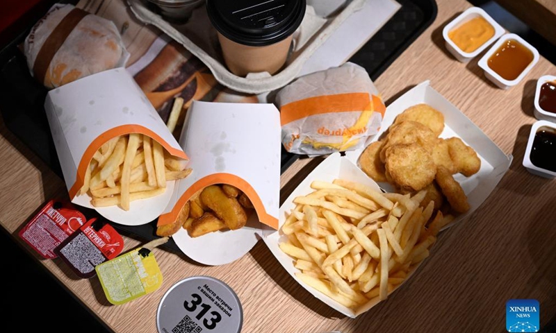 Food is seen on a table at the newly opened fast food restaurant in a former McDonald's outlet in central Moscow, Russia, on June 12, 2022.Photo:Xinhua