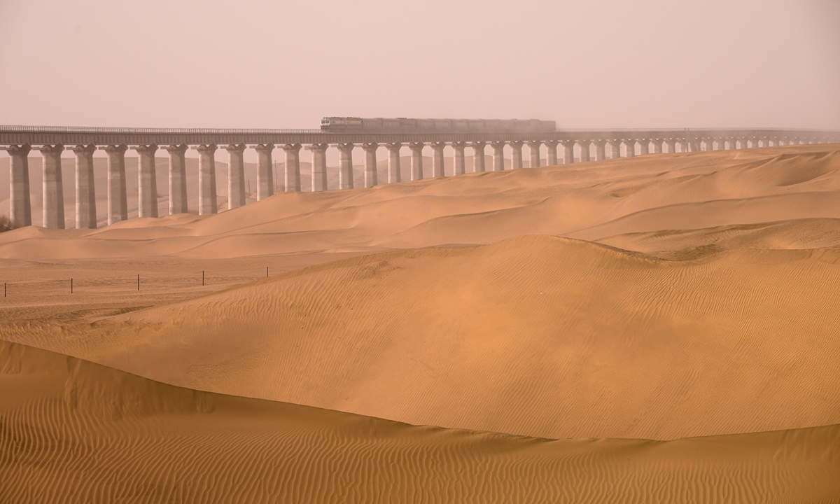 China to complete world's first railway loop around a desert in Xinjiang