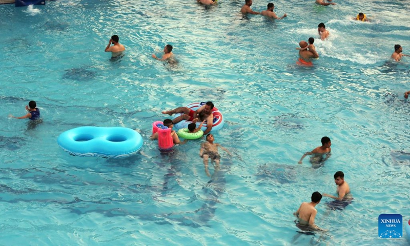 People spend time at a water park during a hot day in Baghdad, Iraq, on June 20, 2022. Iraq witnessed hot weather recently, with the highest temperature soaring to 50 degrees Celsius in some regions of the country.(Photo: Xinhua)