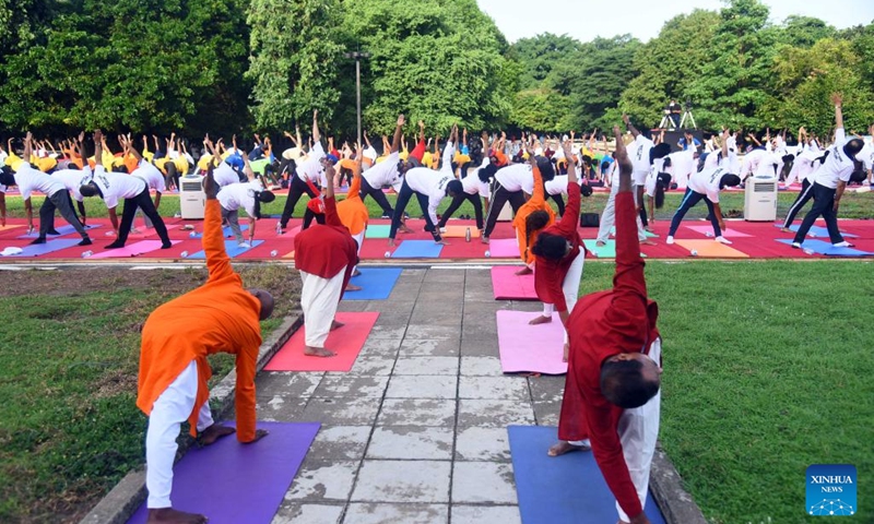 People perform yoga to mark the International Yoga Day in Colombo, Sri Lanka, on June 21, 2022.(Photo: Xinhua)