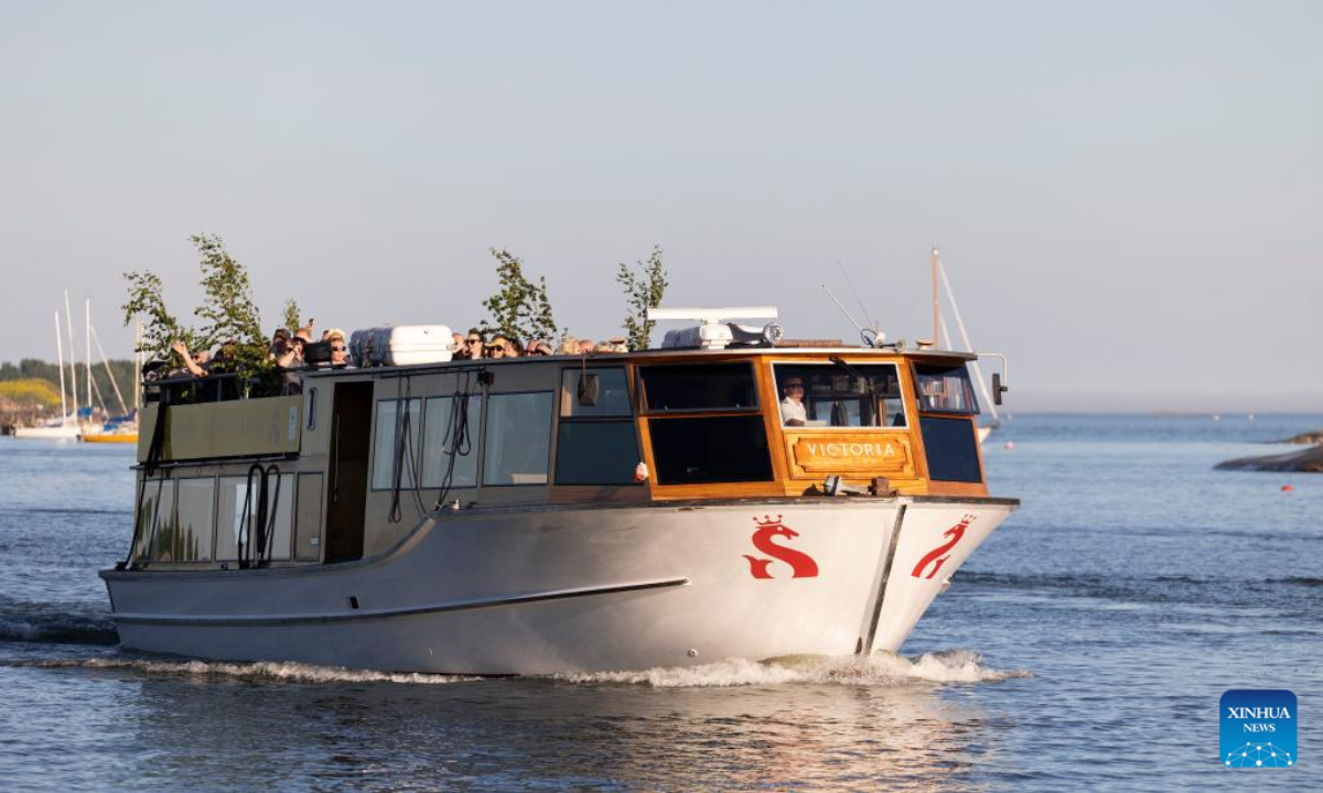 People celebrate Midsummer eve at Kaivopuisto Park in Helsinki, Finland, June 24, 2022. Midsummer Festival is an important festival and also one of the national holidays in Finland. Photo:Xinhua