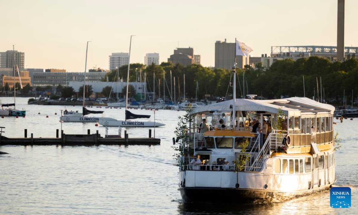 People celebrate Midsummer eve at Kaivopuisto Park in Helsinki, Finland, June 24, 2022. Midsummer Festival is an important festival and also one of the national holidays in Finland. Photo:Xinhua