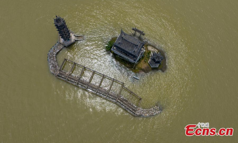 Photo shows the flooded historic site of Luoxingdun Island in Poyang Lake of Lushan City, east China's Jiangxi Province, June 25, 2022. The water level of Poyang Lake, China's biggest freshwater lake, continued to rise due to the heavy rainfall. (Photo: China News Service/Ma Gang)