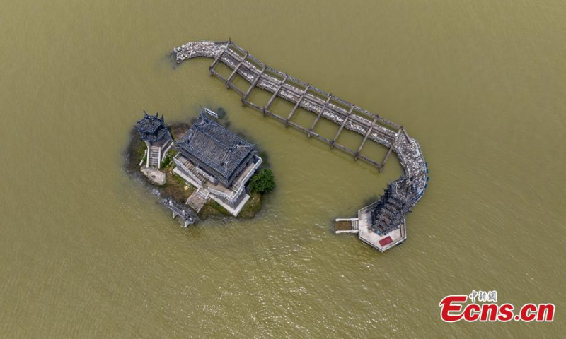 Photo shows the flooded historic site of Luoxingdun Island in Poyang Lake of Lushan City, east China's Jiangxi Province, June 25, 2022. The water level of Poyang Lake, China's biggest freshwater lake, continued to rise due to the heavy rainfall. (Photo: China News Service/Ma Gang)